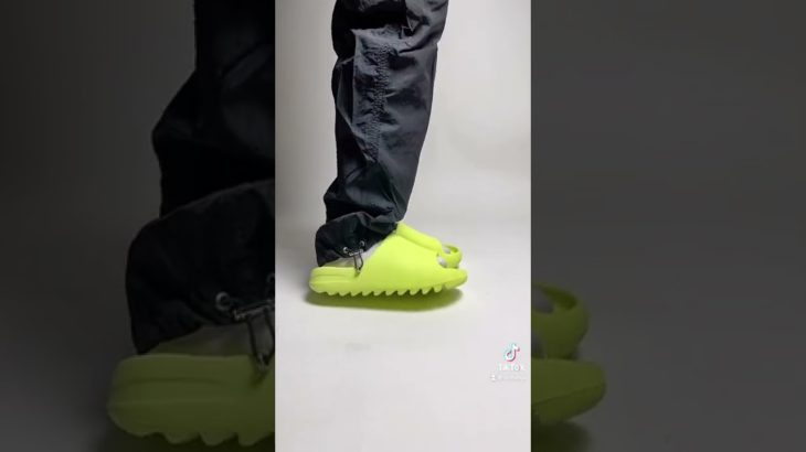 Yeezy Slide Glow Green on feet #yeezy #yeezyslides #yeezyslide #glowgreen #adidas