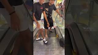 He stuck his Yeezy Slides in the escalator #shorts