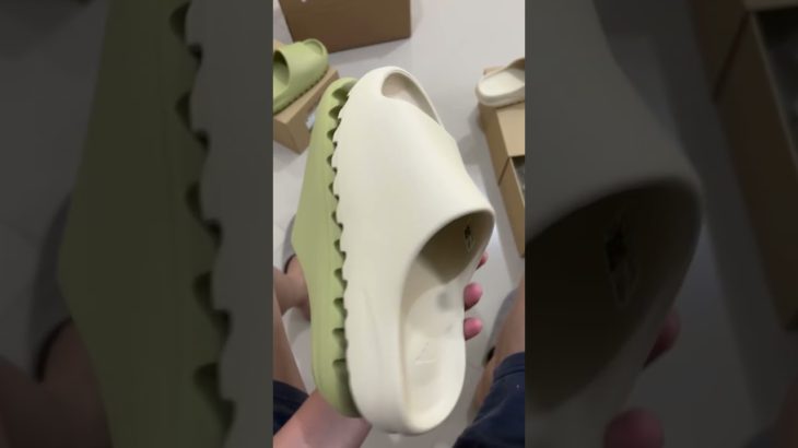 2022 rerelease: Yeezy Slide Resin US9 Vs. Bone US 10. Disappointed with Bone’s size—runs small.