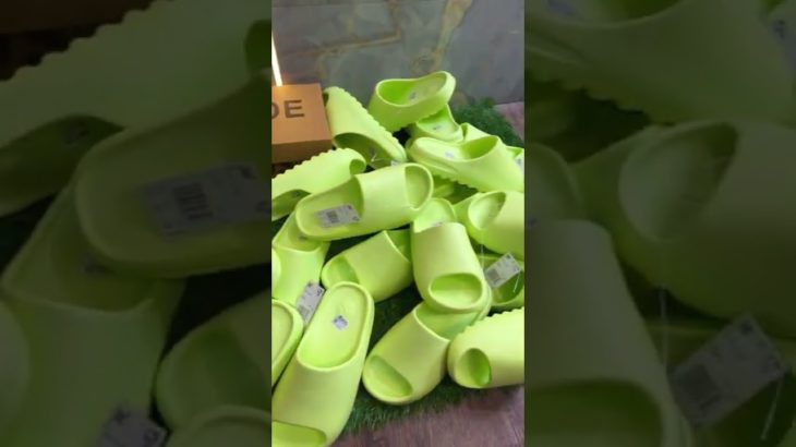 Adidas Yeezy slides glow green