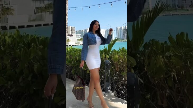 Outfit Style from Miami white dress to impress with jacket and handbag #style