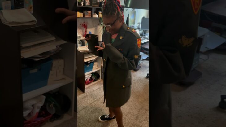 Wearing dads army jacket . He cannot fit it lol