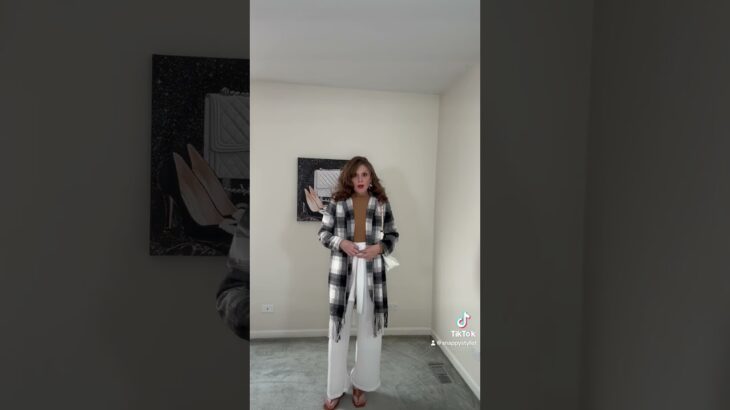 Styling plaid fringe jacket light brown mock turtleneck cream tie pants brown wedges