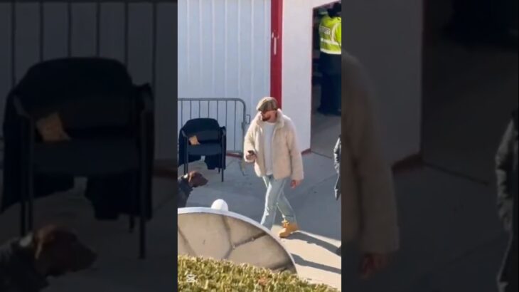 Travis Kelce rocks a fluffy jacket and Louis Vuitton cap at the Chiefs-Texans game.