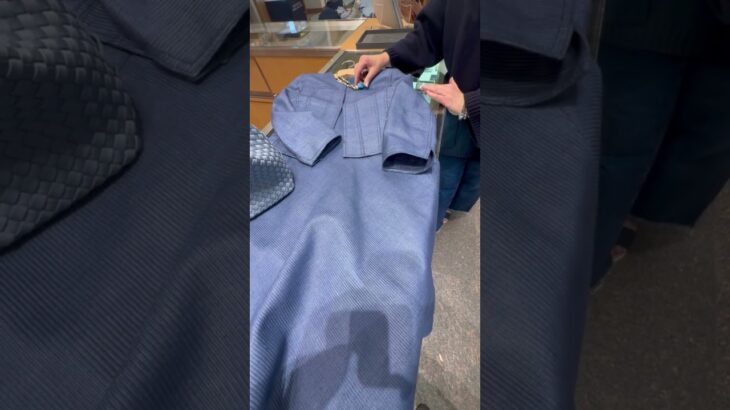 Silk sleeveless dress with matching jacket from Akros Punto, paired with a Clara Williams gold neckl