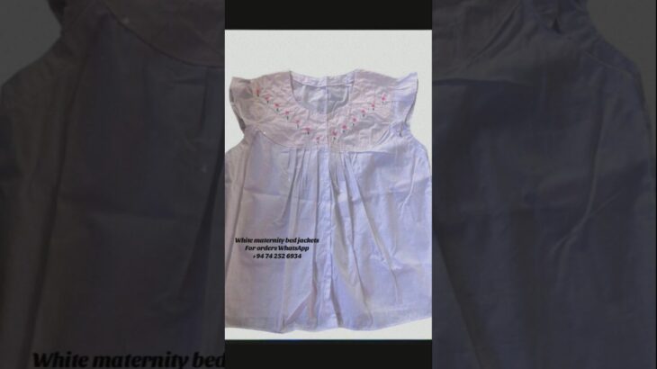 Stay cozy and stylish during pregnancy with our white maternity bed jacket!