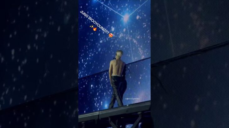 Wooyoung showing his back and removing his jacket at the end of Sagittarius in New York🔥✨