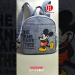 A denim jacket can be modified into a backpack.