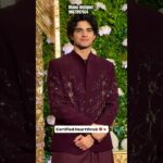 “Elegant maroon open jacket with intricate handwork, paired with Armani machine-fit pants —